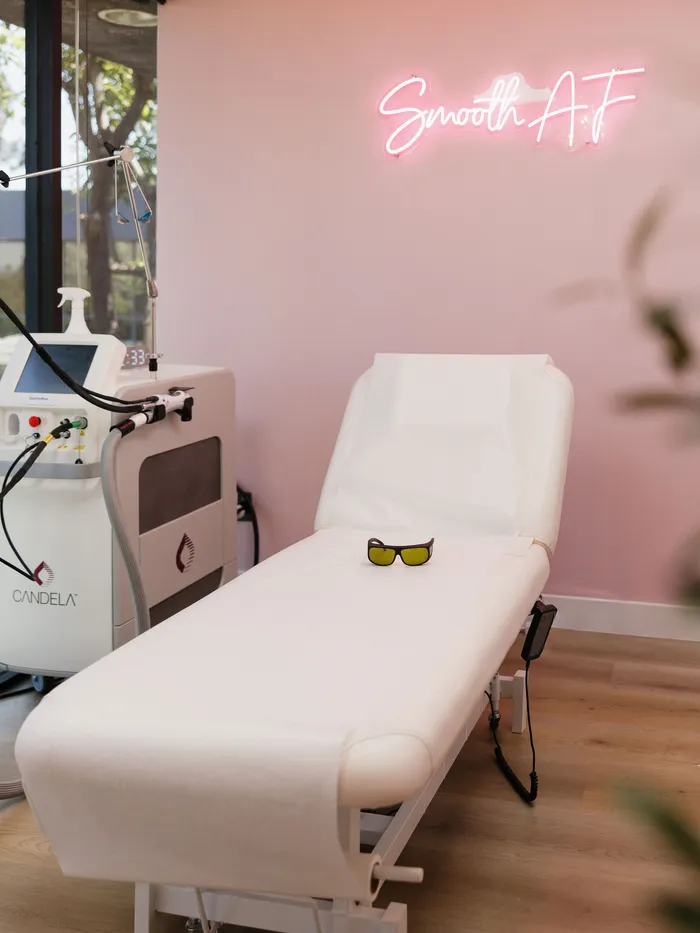 Treatment room with the Candela GentleMax Pro and treatment bed